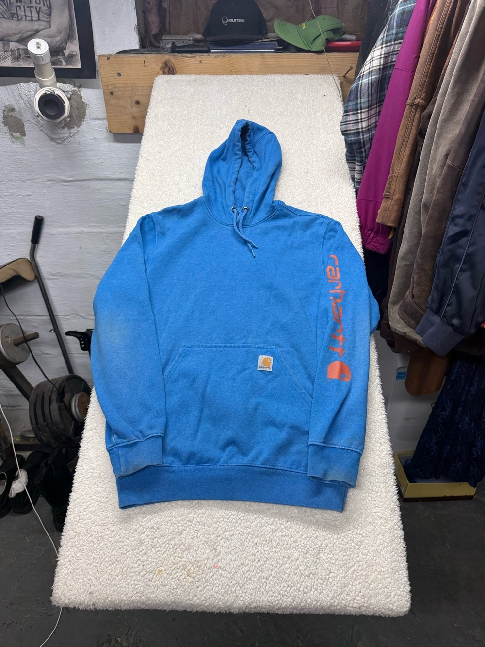 Carhartt Blue Hooded Sweatshirt with Sleeve Logo, size small loose fit